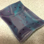 Purple and aqua small platter. Item number 69: 7" by 9"