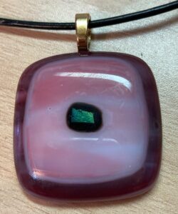 Cranberry and pink glass with green dichroic. Item number N71: 1 1/2" x 1 1/2" inches. Price: $10