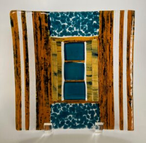 Beautiful green/blue and yellow shades on-edge statement piece that mimics a wall with a door/window in the middle. Number 224. Size: 8" by 8". Price: $50